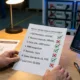 SunLith Energy Tech Person holding a BESS supplier BMS evaluation checklist with red flags and green flags, technical spec sheet visible on desk — Sunlith Energy procurement guide