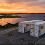 bess-oversizing-hero - SunLith Energy SunLith Energy Large BESS containers alongside a utility-scale solar farm illustrating BESS oversizing strategy