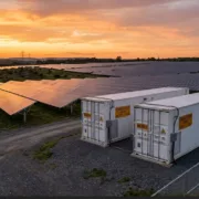 bess-oversizing-hero - SunLith Energy SunLith Energy Large BESS containers alongside a utility-scale solar farm illustrating BESS oversizing strategy