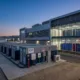 AI Data Center BESS Deployment - SunLith Energy SunLith Energy AI data center BESS battery containers beside server halls