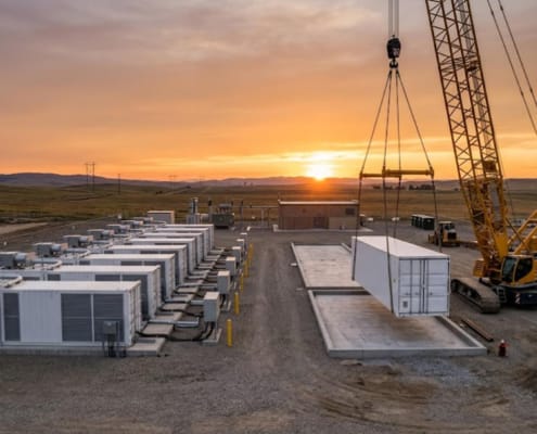 SunLith Energy BESS augmentation guide showing a battery storage site adding new racks mid-life