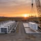 SunLith Energy BESS augmentation guide showing a battery storage site adding new racks mid-life