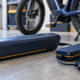 SunLith Energy E-bike battery fires prevention: certified e-bike battery pack and charger on a hard surface